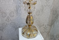 Lampa v dolní části díla
