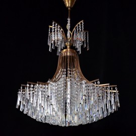 The design chandelier with cut crystal hooves - brown stained brass ANTIK